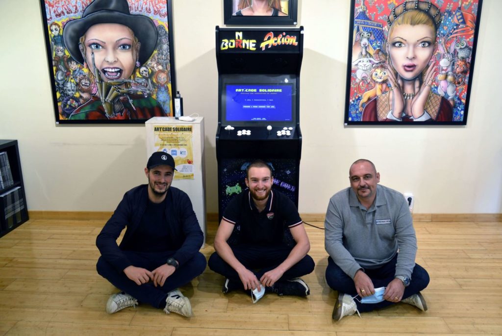 photo equipe borne arcade galerie art